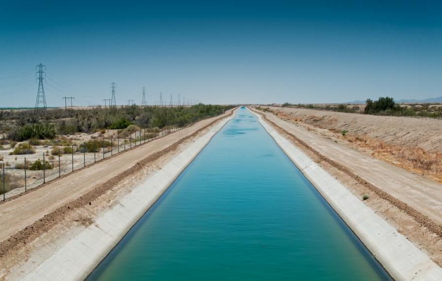 Drone shot of the Coachella Canal, an aqueduct in the desert which carries water from the Colorado River across Riverside and Imperial Counties in California, from the All-American Canal to the Coachella Valley.